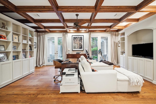 living area with light wood finished floors, french doors, ceiling fan, and plenty of natural light