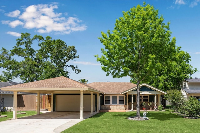 ranch-style house with driveway, an attached garage, a front yard, brick siding, and roof with shingles