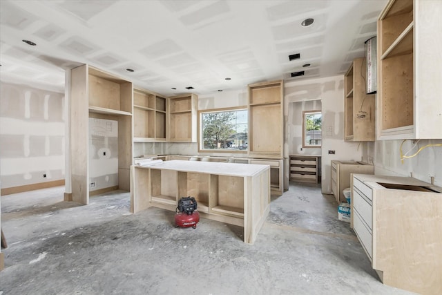 2006 Chantilly Ln, Houston, TX 77018 - kitchen with open shelves, a kitchen island, and light brown cabinetry