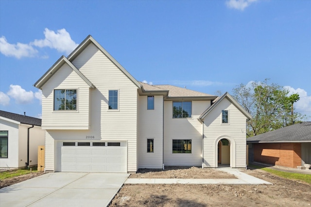 2006 Chantilly Ln, Houston, TX 77018 - view of front of home with driveway and a garage