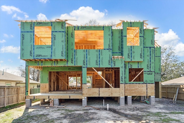 back of property featuring an outdoor structure and an exterior structure
