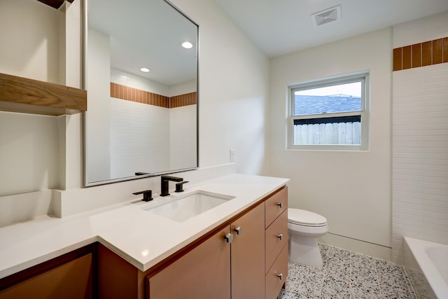 full bathroom with vanity, speckled floor, visible vents, recessed lighting, and toilet