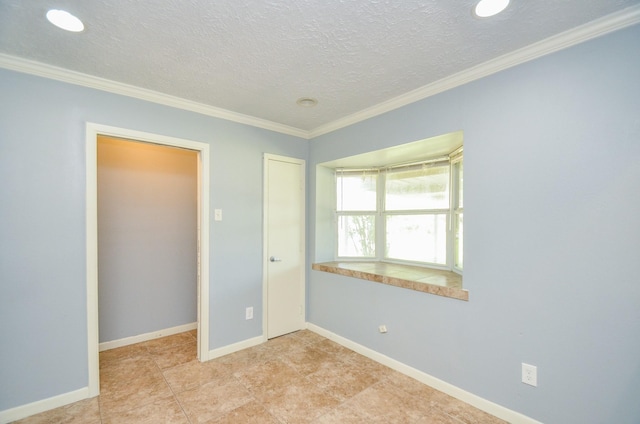 6606 Flamingo Dr, Houston, TX 77087 - unfurnished bedroom with a textured ceiling, baseboards, and ornamental molding