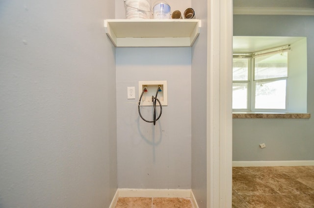 6606 Flamingo Dr, Houston, TX 77087 - washroom with washer hookup, baseboards, and ornamental molding