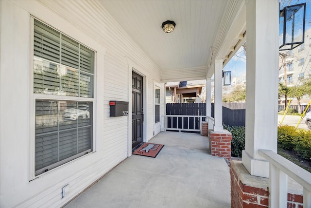 1505 Bonner St, Houston, TX 77007 - view of patio featuring a porch and fence