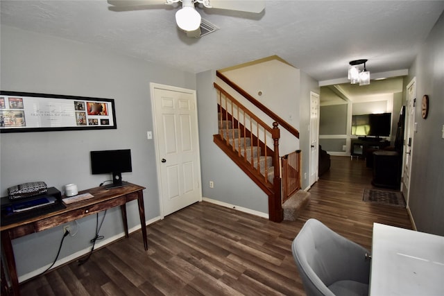 foyer entrance with wood finished floors, stairs, ceiling fan, and baseboards