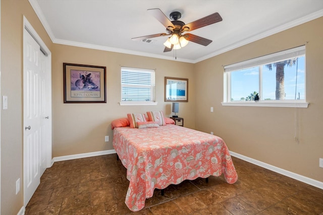 bedroom with stone finish floor, baseboards, multiple windows, and visible vents