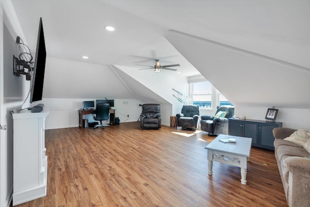 interior space with light wood-type flooring, ceiling fan, vaulted ceiling, and recessed lighting