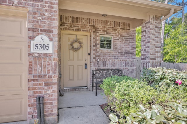 5305 Weeping Bow, Willis, TX 77378 - doorway to property with brick siding and fence