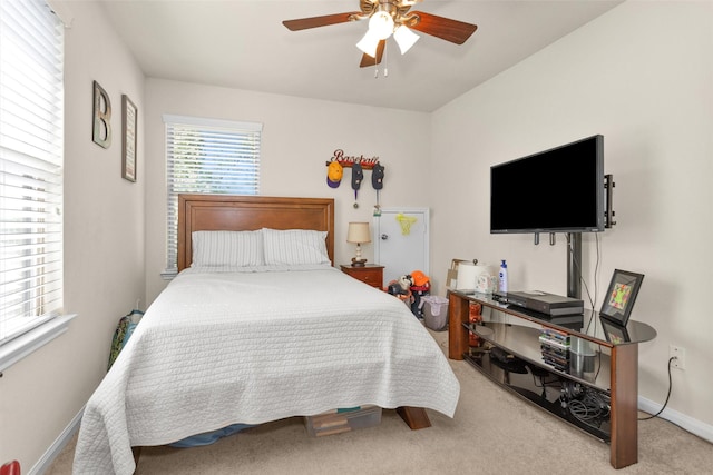 5305 Weeping Bow, Willis, TX 77378 - carpeted bedroom with baseboards and a ceiling fan