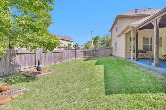 5305 Weeping Bow, Willis, TX 77378 - view of yard featuring a patio and a fenced backyard
