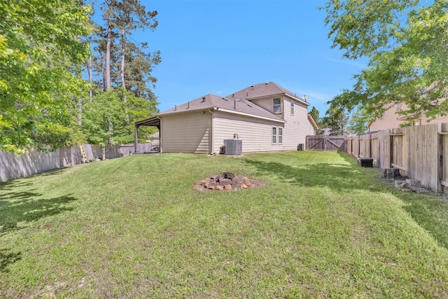 5305 Weeping Bow, Willis, TX 77378 - view of yard with a fenced backyard, cooling unit, and a gate