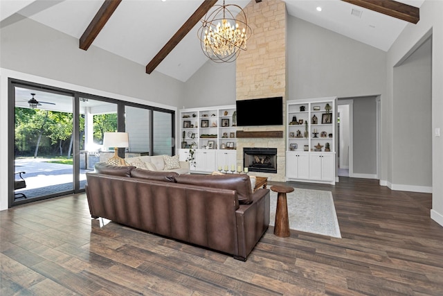 living room with beamed ceiling, baseboards, a stone fireplace, and high vaulted ceiling