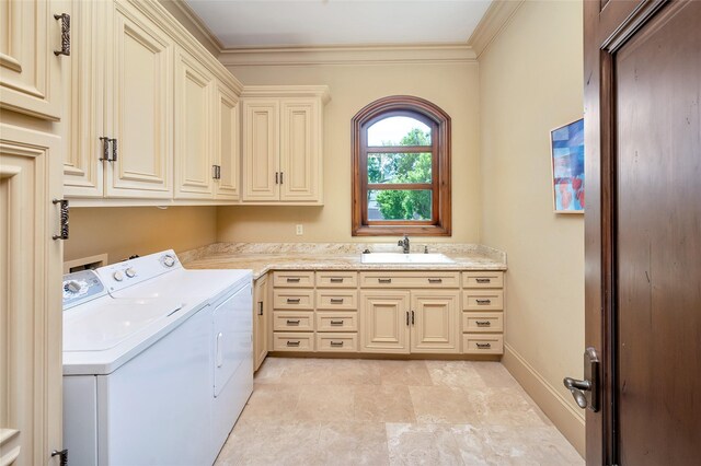 5530 Tilbury Dr, Houston, TX 77056 - laundry area featuring crown molding, a sink, cabinet space, and washing machine and dryer