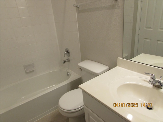 full bath featuring toilet, vanity, and shower / washtub combination