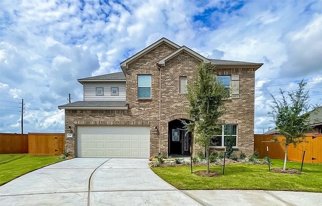 108 Solana Point Dr, Katy, TX 77493 - traditional-style house featuring a front yard, a garage, fence, concrete driveway, and brick siding
