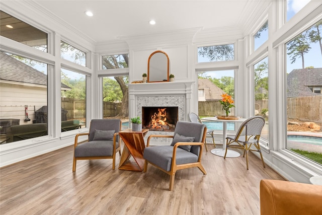sunroom featuring healthy amount of natural light
