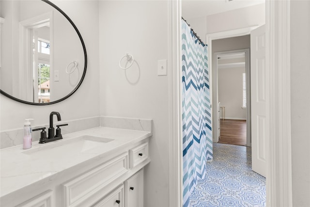 bathroom with vanity and tile patterned floors