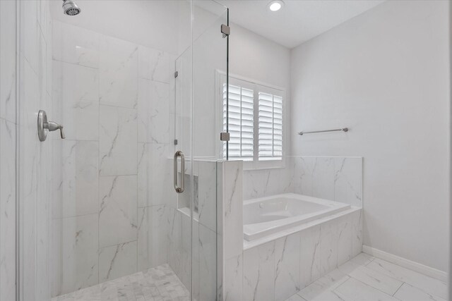 7914 Rio Crystal Dr, Houston, TX 77095 - bathroom with a marble finish shower, a bath, marble look tile flooring, baseboards, and recessed lighting