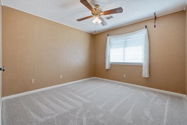 7914 Rio Crystal Dr, Houston, TX 77095 - carpeted empty room featuring a ceiling fan, baseboards, and a textured ceiling