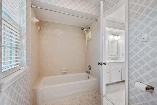 7914 Rio Crystal Dr, Houston, TX 77095 - bathroom with shower / washtub combination, vanity, wallpapered walls, and tile patterned flooring