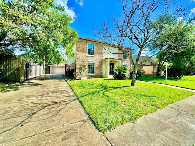 7914 Oakington Dr, Houston, TX 77071 - traditional-style house with a gate, concrete driveway, and brick siding