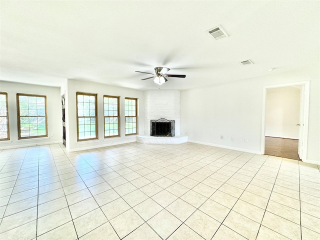 7914 Oakington Dr, Houston, TX 77071 - unfurnished living room featuring a ceiling fan, plenty of natural light, and light tile patterned floors