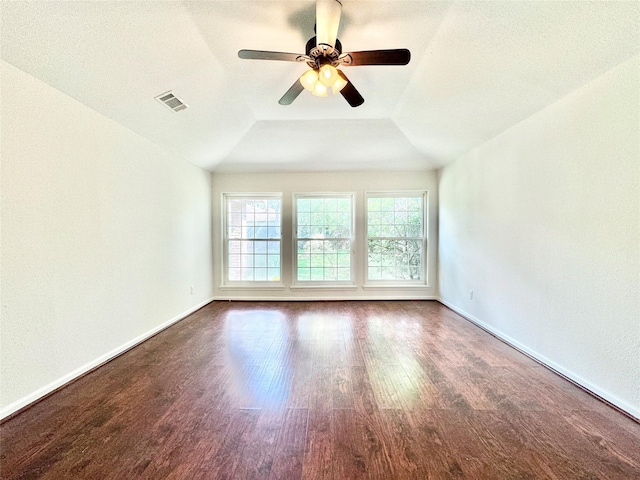 7914 Oakington Dr, Houston, TX 77071 - spare room with wood finished floors, ceiling fan, baseboards, and lofted ceiling
