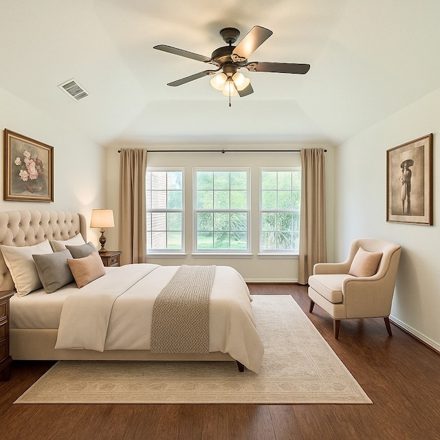 7914 Oakington Dr, Houston, TX 77071 - bedroom with lofted ceiling, dark wood-type flooring, ceiling fan, and baseboards