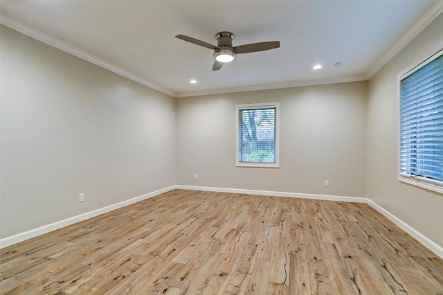 spare room featuring light wood-style flooring, ornamental molding, and recessed lighting