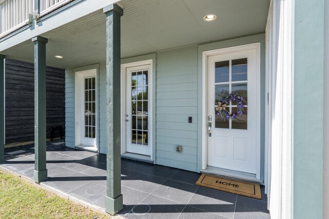 8624 Emnora Ln, Houston, TX 77080 - view of exterior entry with a porch