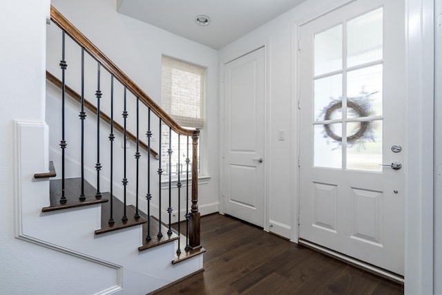 8624 Emnora Ln, Houston, TX 77080 - entrance foyer featuring dark wood-style flooring, plenty of natural light, and stairs