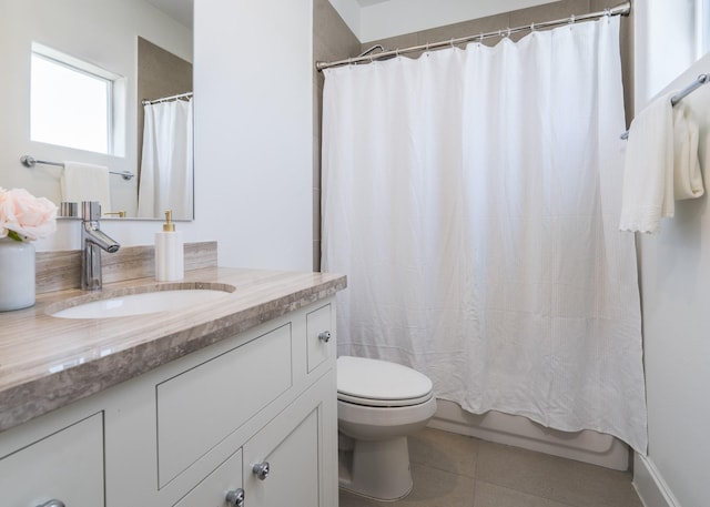 8624 Emnora Ln, Houston, TX 77080 - bathroom featuring toilet, vanity, tile patterned flooring, and shower / tub combo with curtain