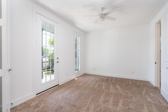 8624 Emnora Ln, Houston, TX 77080 - empty room featuring carpet, a ceiling fan, and baseboards