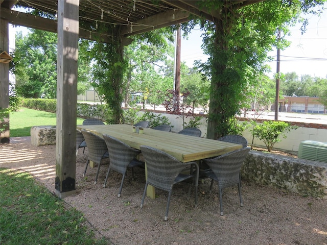 8624 Emnora Ln, Houston, TX 77080 - view of patio / terrace featuring outdoor dining space
