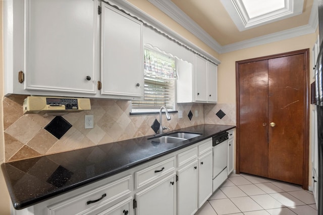 kitchen with a sink, white cabinetry, and white dishwasher