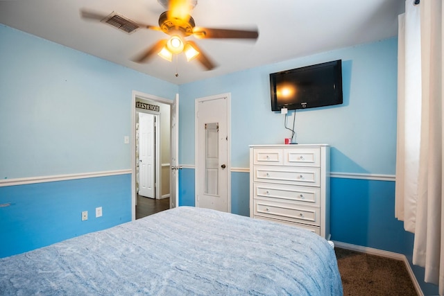 bedroom featuring visible vents, baseboards, and a ceiling fan