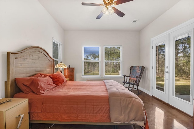 bedroom featuring access to outside, ceiling fan, baseboards, and visible vents