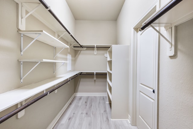 135 N Greatwood Glen Pl, Montgomery, TX 77316 - walk in closet featuring light wood finished floors