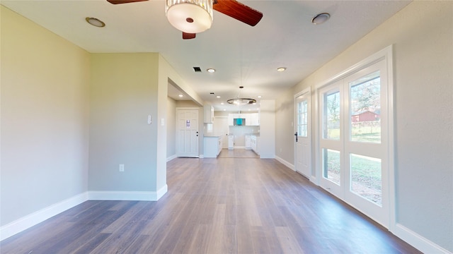 603 Maple Way, Houston, TX 77015 - hall with visible vents, baseboards, recessed lighting, and dark wood-style floors