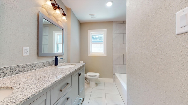 603 Maple Way, Houston, TX 77015 - bathroom with vanity, tile patterned floors, toilet, a washtub, and visible vents