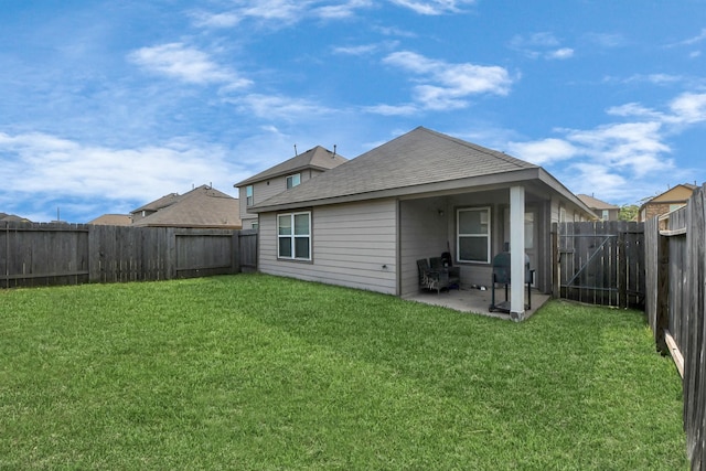 10330 Douglas Fir Villa Ave, Houston, TX 77044 - rear view of house with a patio and roof with shingles