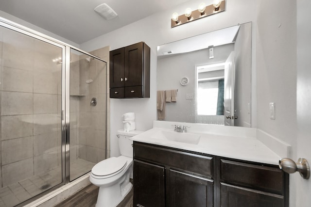 10330 Douglas Fir Villa Ave, Houston, TX 77044 - full bath featuring a shower stall, vanity, toilet, and wood finished floors