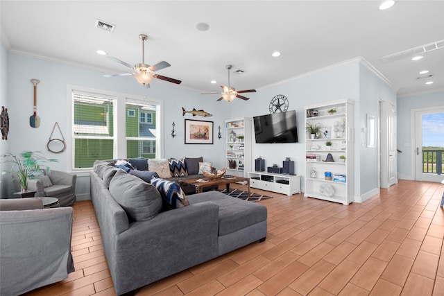 living area with crown molding, baseboards, recessed lighting, and a ceiling fan