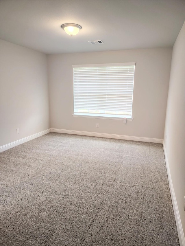 601 Greystone Ln, Angleton, TX 77515 - carpeted spare room featuring baseboards