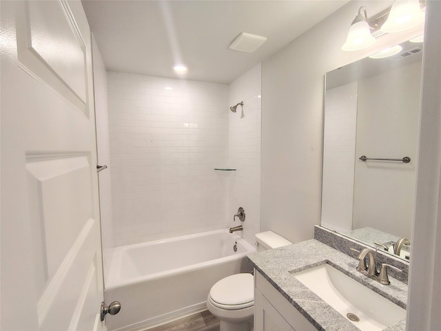 601 Greystone Ln, Angleton, TX 77515 - bathroom with vanity, toilet, tub / shower combination, and wood finished floors