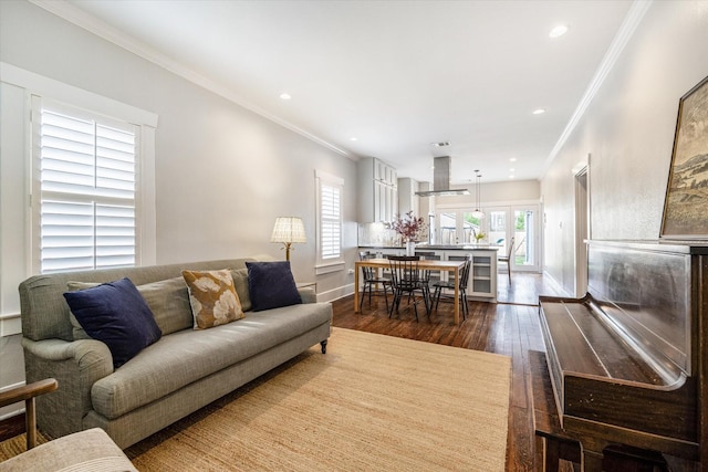 1518 Columbia St, Houston, TX 77008 - living room with dark wood-style flooring, baseboards, crown molding, and recessed lighting