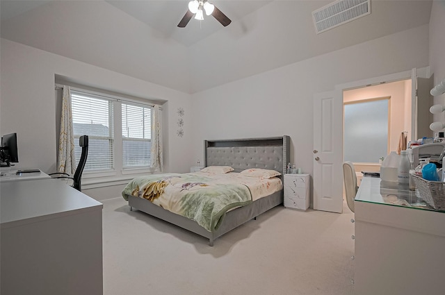 bedroom featuring visible vents, ceiling fan, and light colored carpet