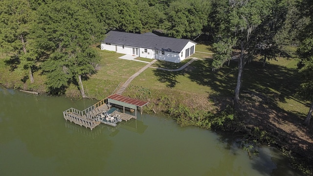 652 E Taylor Lake Cir, Livingston, TX 77351 - bird's eye view with a wooded view and a water view