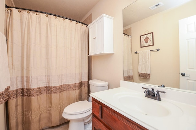 25419 Richton Falls Dr, Richmond, TX 77406 - full bath with visible vents, vanity, a shower with shower curtain, and toilet